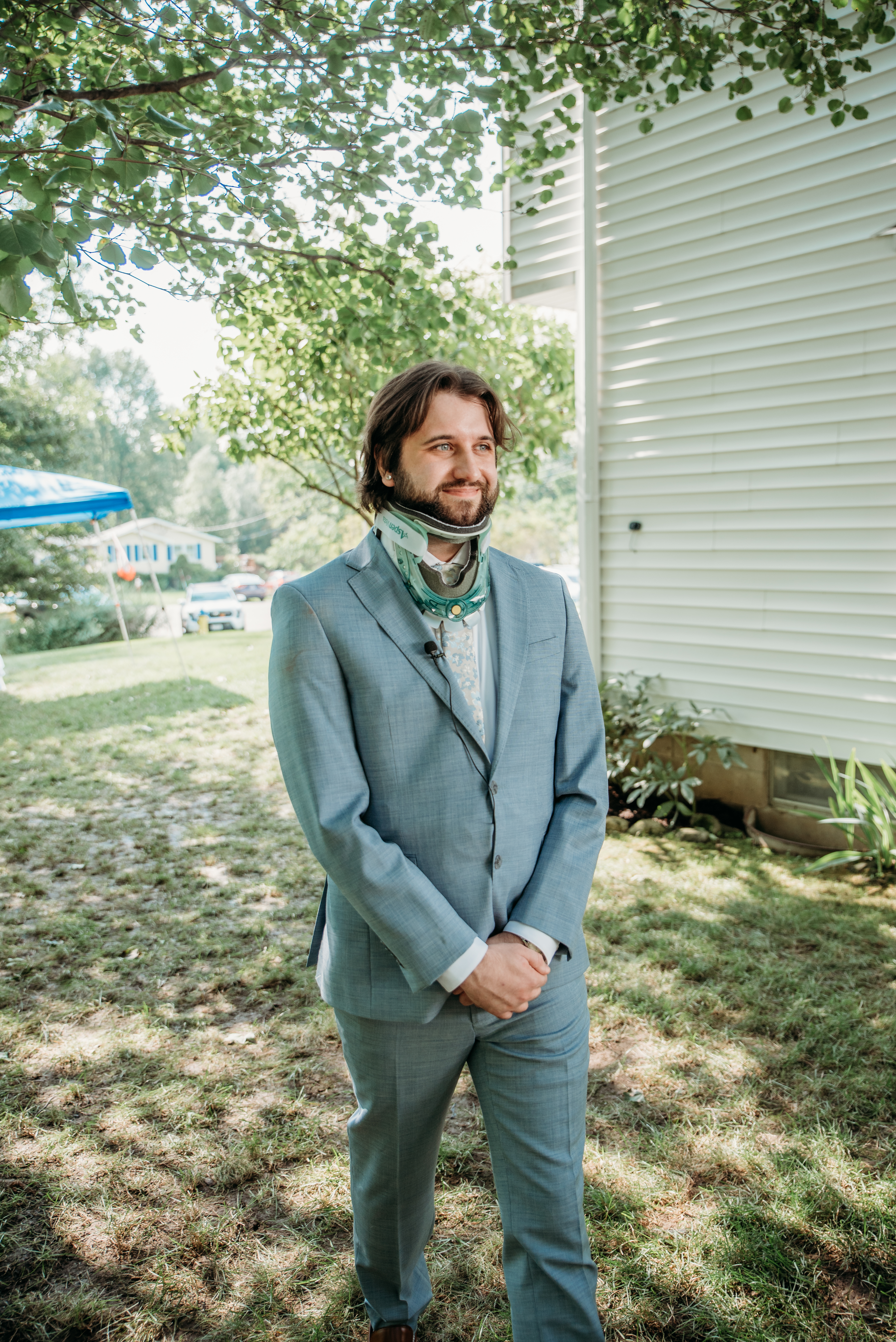 Me walking down the aisle with my neckbrace